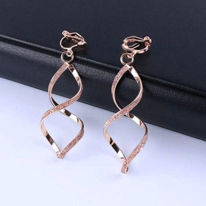 Rose gold shimmering spiral DNA clip-on earrings, non-pierced design, perfect for adding elegance and sophistication to any look.